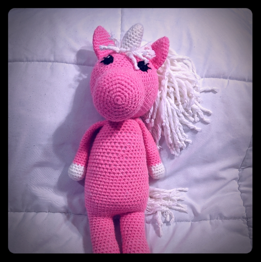 Pink and white crochet unicorn